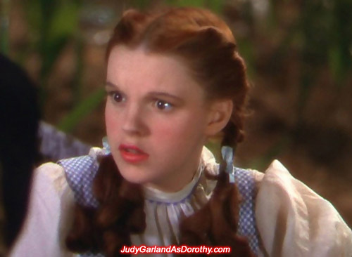 Judy Garland as Dorothy gives a concerned look in MGM's The Wizard of Oz